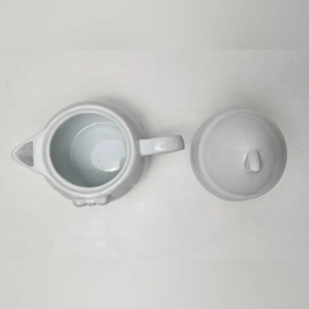Vintage Penguin Creamer and Sugar Bowl Stacked.
